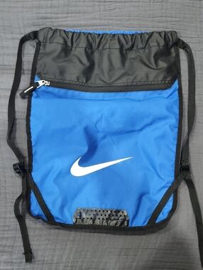 Nike Blue and Black Drawstring Backpack with White Swoosh